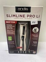 Photo of Andis Slimline Pro Li trimmer in original retail box showing product image, branding, and features.