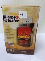 Photo of the Flame Heater packaging box showing product image, features, and specifications.