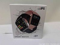 Photo of the IPS Smart Watch box showing two smart watches with black and rose gold bands and digital displays with health and time data.