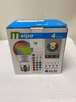 Box showing Melpo 4 pack multi-color LED bulbs from Practical Series with color and remote control capabilities.