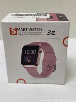 Photo of the smart watch box showing product image and branding.