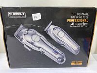 Boxed Suprent HC596 professional lithium-ion cordless hair clippers, two units shown on packaging in silver color.
