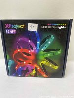 Front view of the XProject LED Strip Lights box showing branding, length (65.6FT), and colorful LED strip representation.