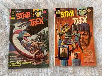 Front covers of two vintage Star Trek comic books, issues #26 and #38, showing original color cover art.