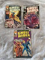 Three Ghost Rider comic books, issues #42, #43, and #44, showing the front covers with colorful artwork and Marvel Comics Group logo.