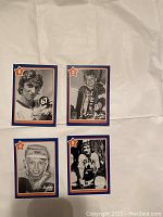 Fronts of four Neilson 1982-83 Wayne Gretzky hockey cards with number and portrait photos