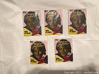 Front view of five sealed 1984 Topps Michael Jackson 2nd Series trading card packs.