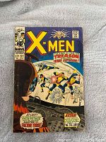 Front cover of The X-Men comic book issue #37 showing X-Men characters and title text