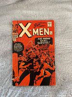 Front cover of the X-Men comic book issue 17 showing Red and Black illustration with X-Men characters and title text.