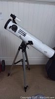 Full view of Orbitor 3200 telescope mounted on tripod with finder scope attached.