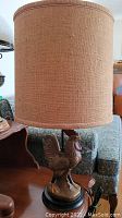 Front view of burlap lamp shade showing fabric texture.