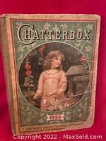 Front cover of the 1903 Chatterbox Annual showing child illustration with floral border and title text.