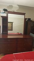 Full view of dresser with attached mirror