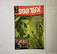 Front cover of the 1968 Star Trek comic book No. 3 showing Star Trek characters and title with 15c price.