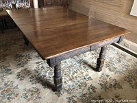 Full view of table with both extension leaves inserted