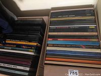 Two boxes filled with boxed classical LP record sets featuring works by Verdi, Abbado, and Karajan