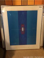 Full view of the framed art print showing overall condition and size