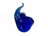 Blue art glass elephant figurine isolated on white background, showing trunk raised and clear shiny surface.