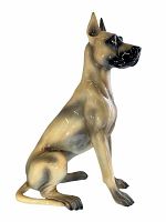 Front and side views of a porcelain Great Dane figurine by Will George, showing the realistic paint and details, with no visible damage.
