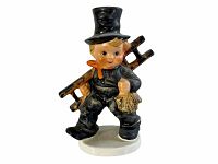 Front view of Hummel chimney sweep figurine showing painted details and stance