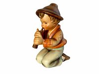 Full clear view of the Hummel Little Tooter figurine showing the boy kneeling and playing a pipe, highlighting the colors and condition.