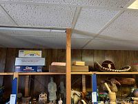 Close up of boxed vintage games by Parker Brothers: Eyewitness, Win Lose or Draw, Clue VCR Mystery Game.