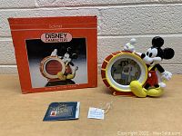 Photo of the vintage Schmid Disney Mickey Mouse musical picture frame with original box, booklet, and product tag included.