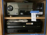 Both components installed side by side on shelving