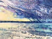 Close-up of textured encaustic surface showing layered beeswax and resin with hues of blue, purple, and yellow