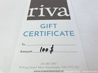 Front of gift certificate showing Riva logo, 'To' line, handwritten '100$' amount, restaurant address and phone