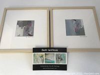 Photo showing the two framed fine art paintings by Beth tenHove, matted and in wood frames, along with a promotional card for the artist.