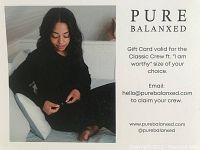Photo of the gift certificate information sheet including a model wearing a black crew neck shirt and text information about redeeming the certificate for the Pure Balanxed Classic Crew shirt.