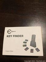 Front of the Esky Key Finder box showing model KF06A and illustration of receiver with 3 key fobs.