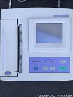 Top-down front view showing LCD screen, keypad and thermal printer slot