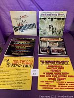 Photo of 6 vinyl records with front album covers visible including Brigadoon, The King Family Show 2, The King Family Album, Percy Faith, and The Wonderful World of Motion Pictures.