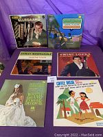 Front photo showing 6 of the album covers including Herb Alpert, Trini Lopez, and others.