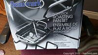 Box for Beaumark Non-Stick Roasting Pan Set with Rack showing product name and image