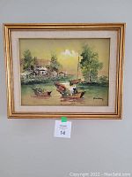 Close-up of framed oil painting showing detailed water scene and signature