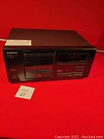 Front view of Pioneer PD-F505 compact disc player showing disc tray, buttons, and model details.