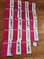 A wide view of 19 vintage Profile Publications magazines arranged on the floor showing their covers with red and white color and aircraft illustrations.