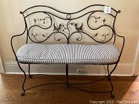 Front view of bench showing entire frame and cushion