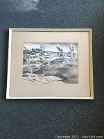Framed original painting of a Canadian landscape showing trees and rocky terrain, framed and matted.