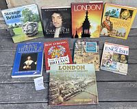 Lot of 9 hardcover books about Britain and England laid out, covers visible with diverse titles including Strange Britain and London