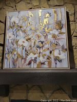 Frontal view of square canvas painting showing full floral composition and frame