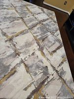 Close-up of rug pattern and color variation