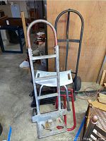 Metal dolly with flat base and vintage finish in warehouse setting