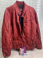 Full front view of the red leather men's jacket showing zipper pockets and ribbed bottom hem.