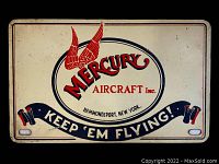 Front view of 1940s Mercury Aircraft steel license plate topper showing design details and condition