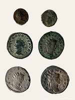 Obverse view of all six coins on white background
