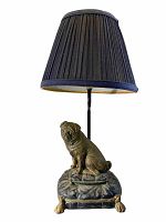 Full view of the vintage pug lamp, showing the dark pleated lampshade and pug figurine seated on cushion base.